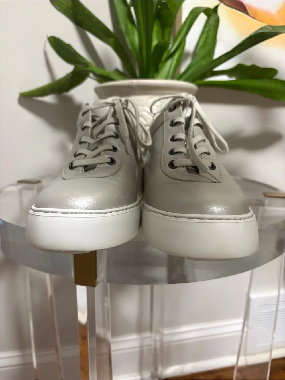 Fly London Dipo wedge trainers in silver leather with a thick white wedge sole